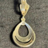 Marcasite Double Row Pear Shaped Hollow Dangle Earring.