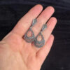 Marcasite Double Row Pear Shaped Hollow Dangle Earring.