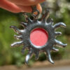 Pendant the sun coral.