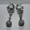 Silver-colored earrings
