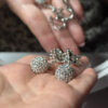 Silver-colored earrings