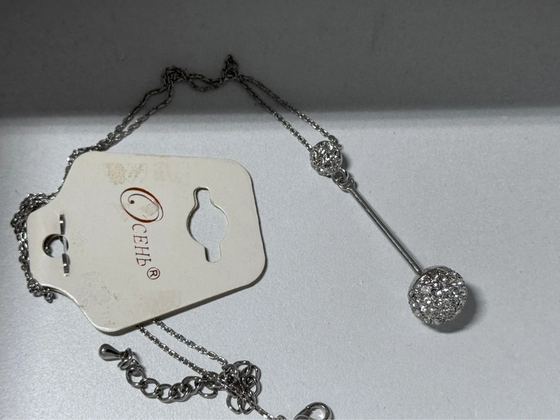 Silver-colored pendant with chain new