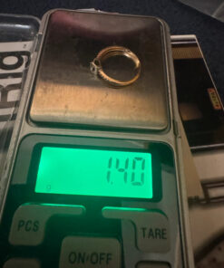 Gold Ring with a central round brilliant stone .585 hallmark, size J½
