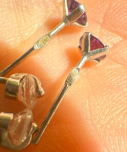 Two pairs of silver stud earrings