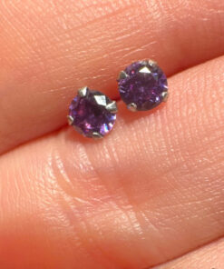 Two pairs of silver stud earrings