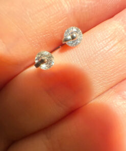 Two pairs of silver stud earrings
