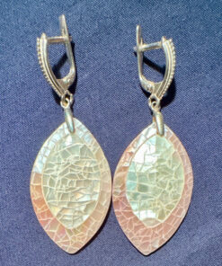 Silver earrings with a mother-of-pearl mosaic, shimmering in pink, white, and blue tones.
