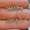 Two-tone gold ear cuffs with cubic zirconia, 585 fineness 14K gold