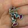 Stunning silver earrings with natural emerald, ruby, and sapphire.