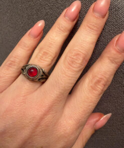 Vintage early 20th-century nickel ring, size L, with a red stone.