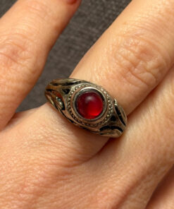 Vintage early 20th-century nickel ring, size L, with a red stone.