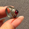Vintage early 20th-century nickel ring, size L, with a red stone.