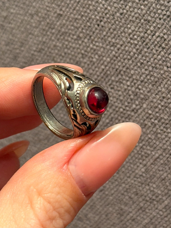 Vintage early 20th-century nickel ring, size L, with a red stone.