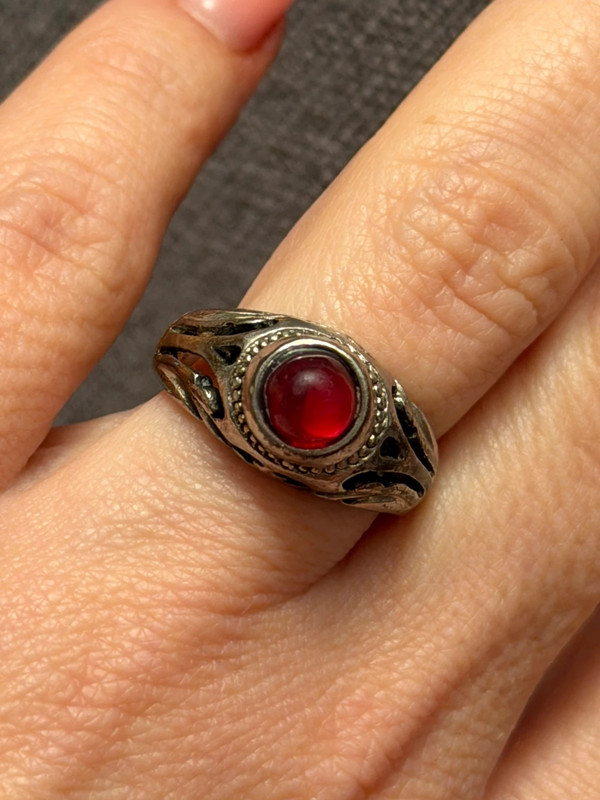 Vintage early 20th-century nickel ring, size L, with a red stone.