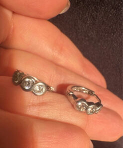 Silver hoop earrings with stones