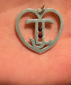 Silver heart with garnet