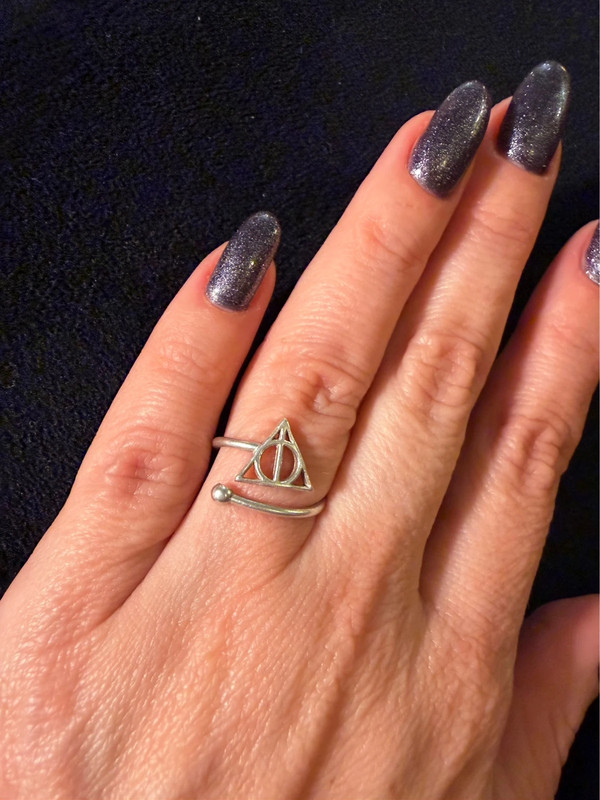 A symbolic ring made of 925 sterling silver, adjustable size, approximate size L (#110)