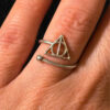 A symbolic ring made of 925 sterling silver, adjustable size, approximate size L (#110)