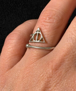 A symbolic ring made of 925 sterling silver, adjustable size, approximate size L