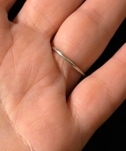A symbolic ring made of 925 sterling silver, adjustable size, approximate size L