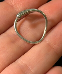 A symbolic ring made of 925 sterling silver, adjustable size, approximate size L