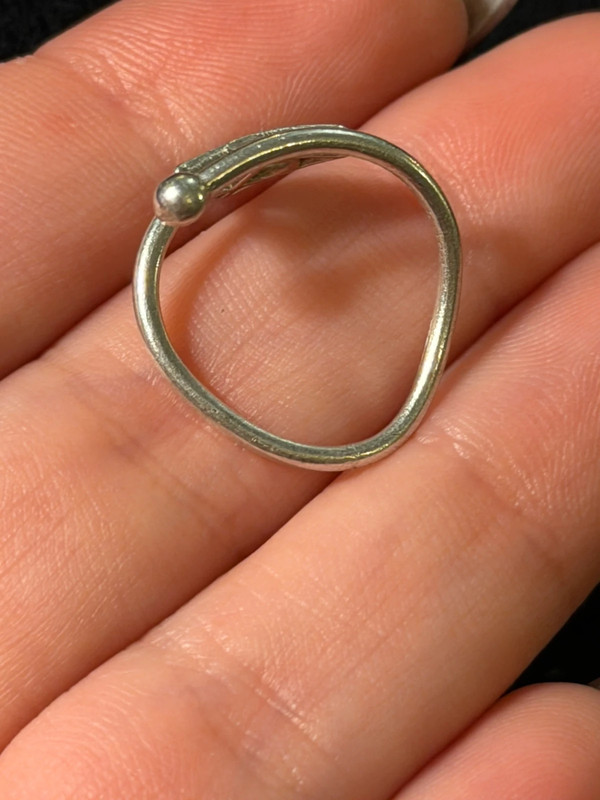 A symbolic ring made of 925 sterling silver, adjustable size, approximate size L (#110)