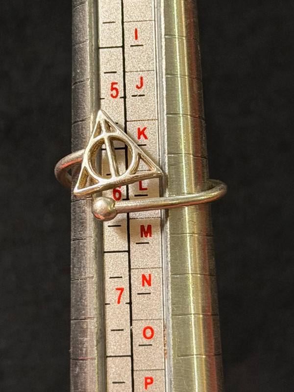 A symbolic ring made of 925 sterling silver, adjustable size, approximate size L (#110)