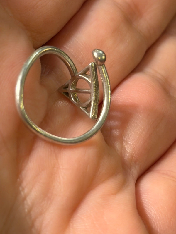A symbolic ring made of 925 sterling silver, adjustable size, approximate size L (#110)
