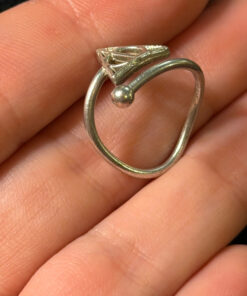 A symbolic ring made of 925 sterling silver, adjustable size, approximate size L