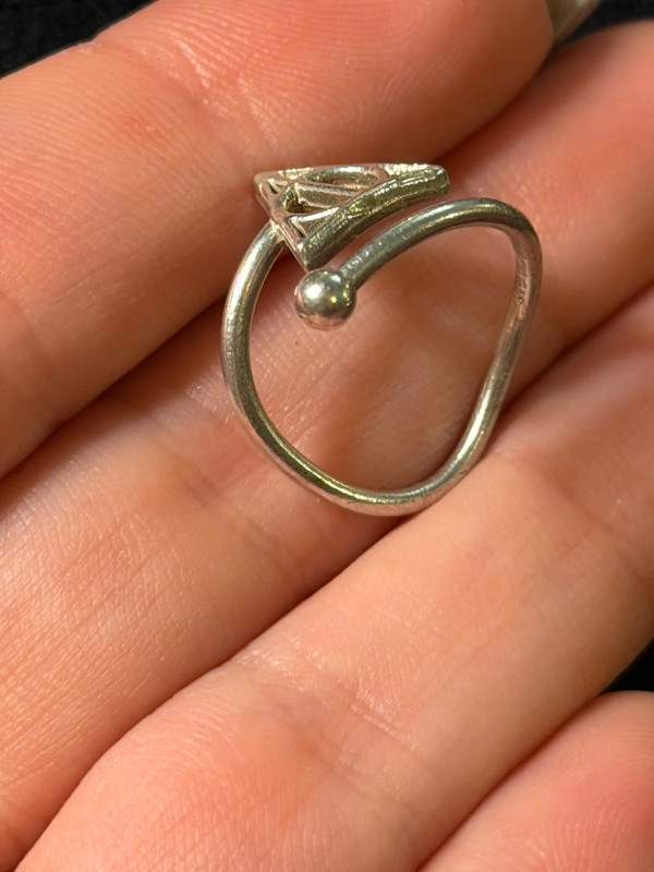 A symbolic ring made of 925 sterling silver, adjustable size, approximate size L (#110)