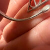 A symbolic ring made of 925 sterling silver, adjustable size, approximate size L (#110)