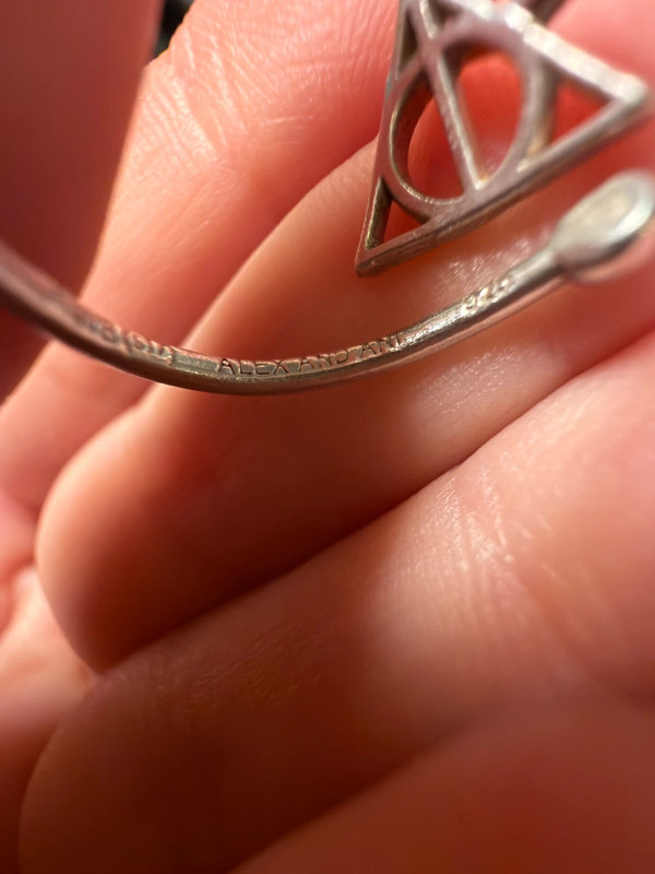 A symbolic ring made of 925 sterling silver, adjustable size, approximate size L (#110)