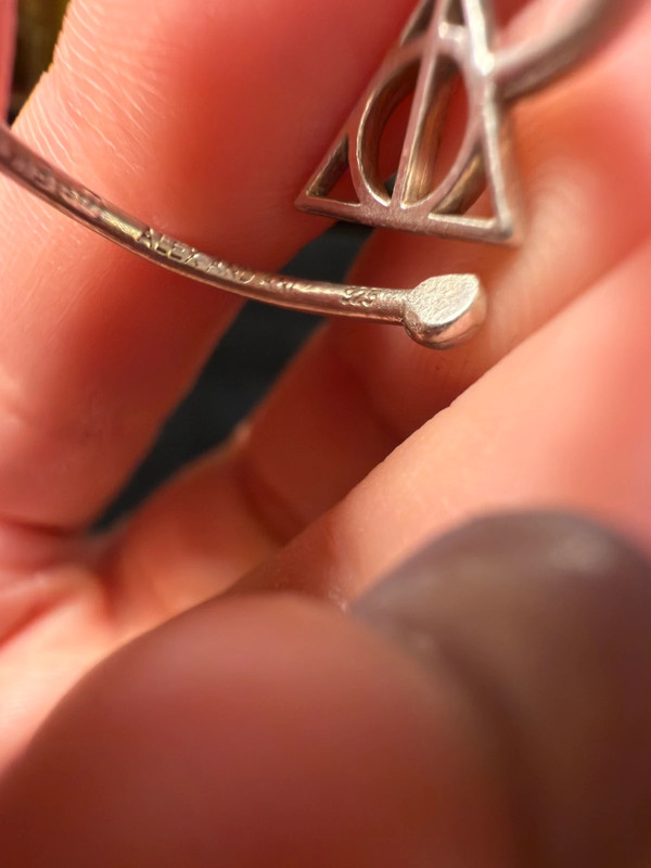 A symbolic ring made of 925 sterling silver, adjustable size, approximate size L (#110)