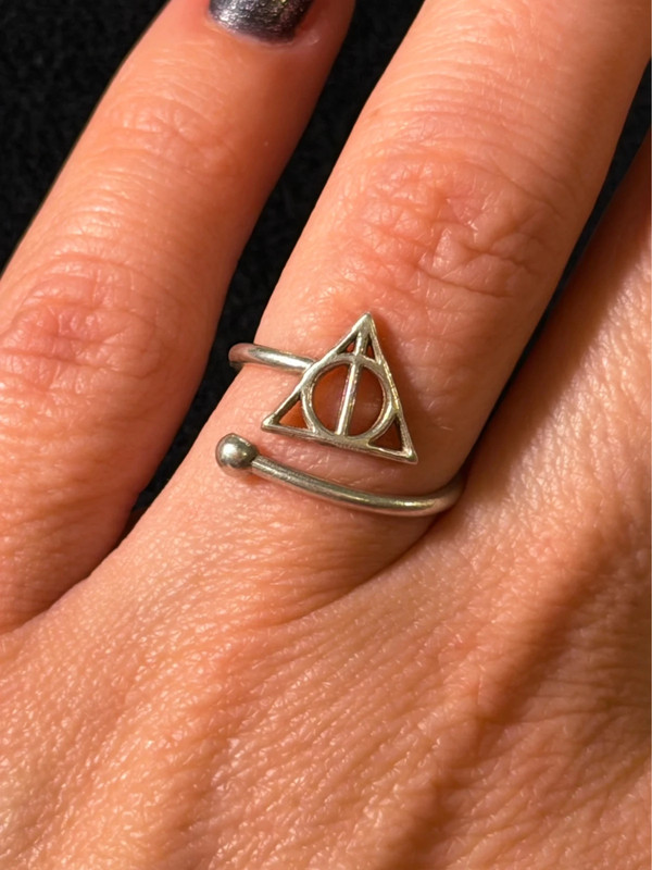 A symbolic ring made of 925 sterling silver, adjustable size, approximate size L (#110)