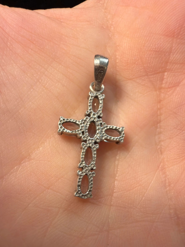 Oval cut natural Swiss blue topaz cross pendant in sterling silver