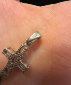 Oval cut natural Swiss blue topaz cross pendant in sterling silver
