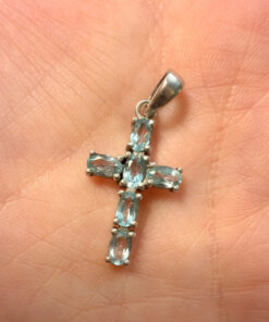 Oval cut natural Swiss blue topaz cross pendant in sterling silver