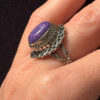 A sterling silver ring with natural charoite, size N 1/2