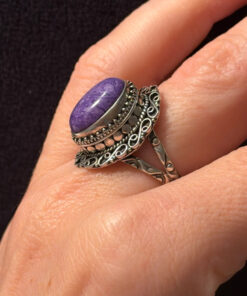 A sterling silver ring with natural charoite, size N 1/2