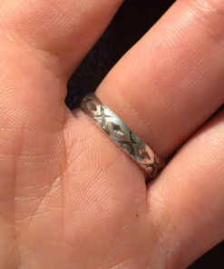 A sterling silver ring with natural charoite, size N 1/2