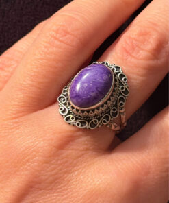 A sterling silver ring with natural charoite, size N 1/2