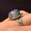 A sterling silver ring with natural charoite, size N 1/2