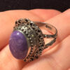 A sterling silver ring with natural charoite, size N 1/2