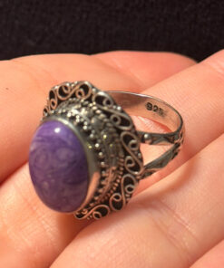 A sterling silver ring with natural charoite, size N 1/2