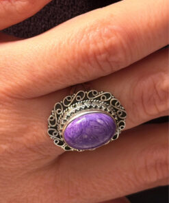 A sterling silver ring with natural charoite, size N 1/2