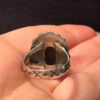 A sterling silver ring with natural charoite, size N 1/2