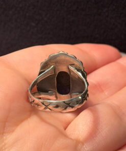 A sterling silver ring with natural charoite, size N 1/2