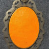 Vintage bronze decorative photo frame with silkscreened print.