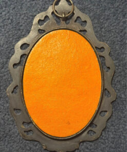 Vintage bronze decorative photo frame with silkscreened print.