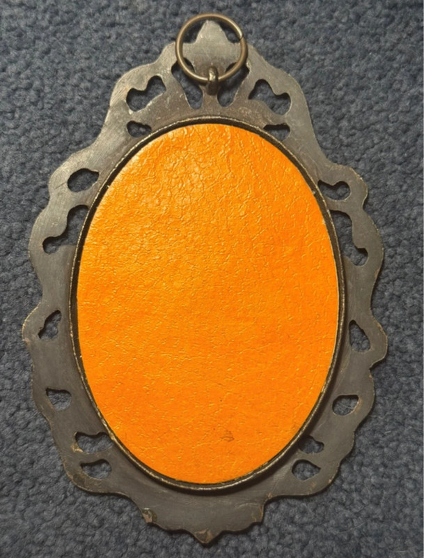 Vintage bronze decorative photo frame with silkscreened print.